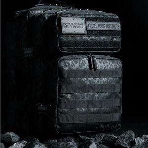 ISO Black Leopard 35L or 45L backpack